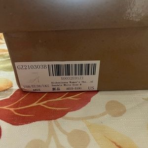 Brand new white wrap up heels